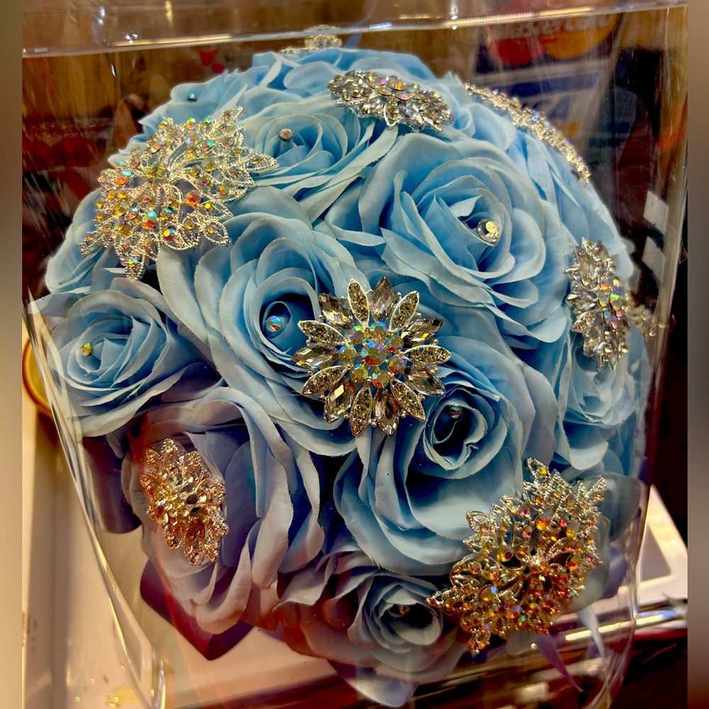 Light blue artificial flower bouquet. Hand made with crystal accents.
